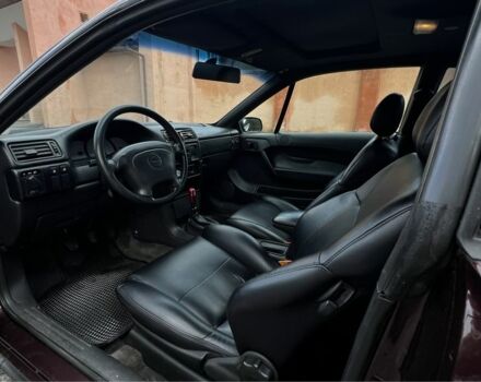 Фиолетовый Опель Калибра, объемом двигателя 2 л и пробегом 280 тыс. км за 2600 $, фото 11 на Automoto.ua