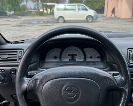 Фиолетовый Опель Калибра, объемом двигателя 2 л и пробегом 280 тыс. км за 2600 $, фото 13 на Automoto.ua