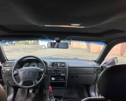 Фиолетовый Опель Калибра, объемом двигателя 2 л и пробегом 280 тыс. км за 2600 $, фото 15 на Automoto.ua