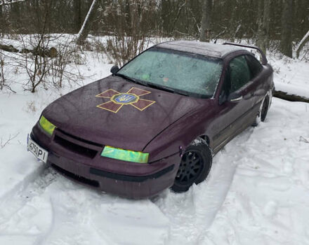 Фиолетовый Опель Калибра, объемом двигателя 2.5 л и пробегом 326 тыс. км за 3000 $, фото 1 на Automoto.ua