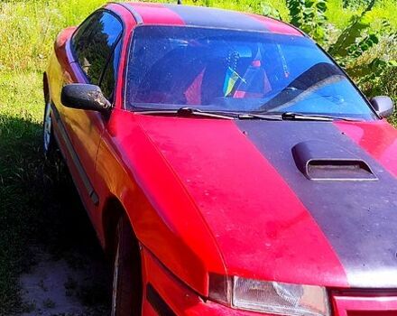 Красный Опель Калибра, объемом двигателя 2 л и пробегом 0 тыс. км за 2000 $, фото 1 на Automoto.ua
