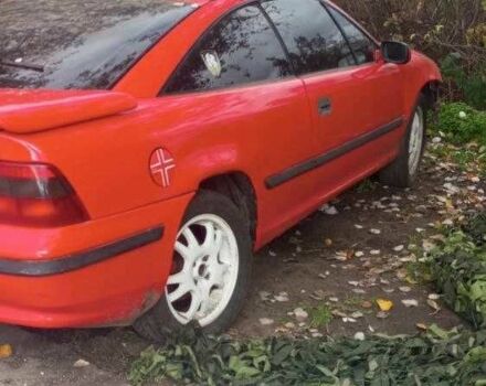 Красный Опель Калибра, объемом двигателя 2 л и пробегом 497 тыс. км за 1200 $, фото 12 на Automoto.ua