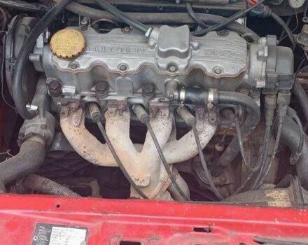 Красный Опель Калибра, объемом двигателя 2 л и пробегом 497 тыс. км за 1200 $, фото 2 на Automoto.ua