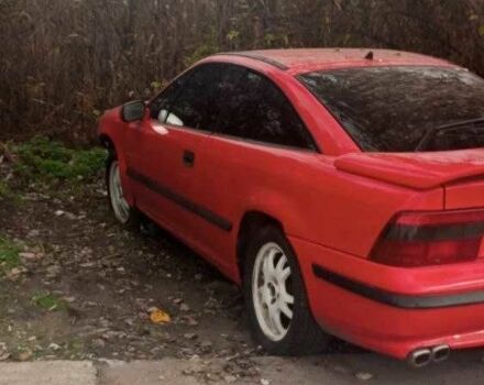 Красный Опель Калибра, объемом двигателя 2 л и пробегом 497 тыс. км за 1200 $, фото 1 на Automoto.ua