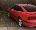Красный Опель Калибра, объемом двигателя 2 л и пробегом 497 тыс. км за 1500 $, фото 4 на Automoto.ua