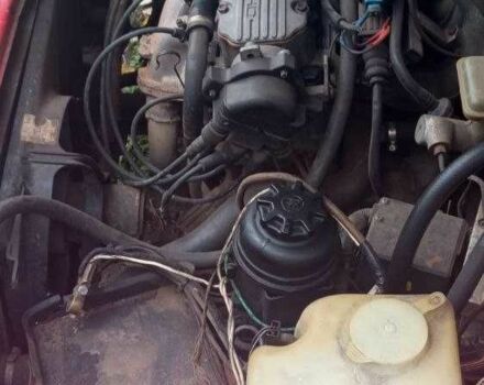 Красный Опель Калибра, объемом двигателя 2 л и пробегом 497 тыс. км за 1200 $, фото 4 на Automoto.ua