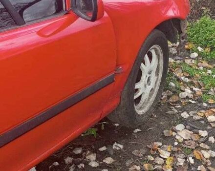 Красный Опель Калибра, объемом двигателя 2 л и пробегом 497 тыс. км за 1200 $, фото 9 на Automoto.ua