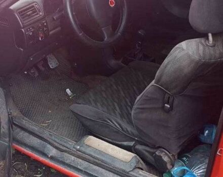 Красный Опель Калибра, объемом двигателя 2 л и пробегом 497 тыс. км за 1500 $, фото 7 на Automoto.ua