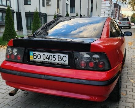 Червоний Опель Калібра, об'ємом двигуна 2 л та пробігом 200 тис. км за 1850 $, фото 4 на Automoto.ua