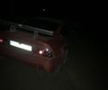 Червоний Опель Калібра, об'ємом двигуна 2 л та пробігом 300 тис. км за 1850 $, фото 4 на Automoto.ua