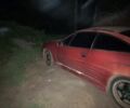 Червоний Опель Калібра, об'ємом двигуна 2 л та пробігом 300 тис. км за 1850 $, фото 3 на Automoto.ua