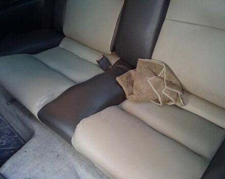 Червоний Опель Калібра, об'ємом двигуна 2 л та пробігом 200 тис. км за 1850 $, фото 7 на Automoto.ua