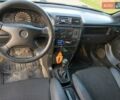 Червоний Опель Калібра, об'ємом двигуна 2 л та пробігом 412 тис. км за 1850 $, фото 19 на Automoto.ua
