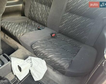 Червоний Опель Калібра, об'ємом двигуна 2 л та пробігом 180 тис. км за 5500 $, фото 3 на Automoto.ua
