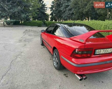 Червоний Опель Калібра, об'ємом двигуна 2 л та пробігом 180 тис. км за 5500 $, фото 1 на Automoto.ua