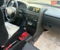 Червоний Опель Калібра, об'ємом двигуна 2 л та пробігом 180 тис. км за 5500 $, фото 5 на Automoto.ua
