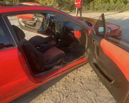 Красный Опель Калибра, объемом двигателя 2 л и пробегом 270 тыс. км за 1700 $, фото 6 на Automoto.ua