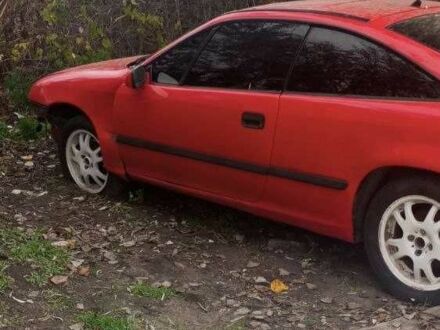 Красный Опель Калибра, объемом двигателя 2 л и пробегом 497 тыс. км за 1500 $, фото 1 на Automoto.ua