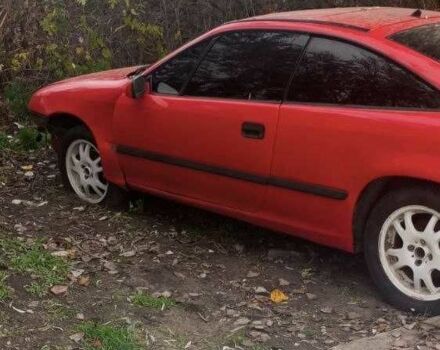 Червоний Опель Калібра, об'ємом двигуна 2 л та пробігом 497 тис. км за 1500 $, фото 1 на Automoto.ua