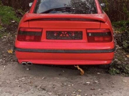 Красный Опель Калибра, объемом двигателя 2 л и пробегом 497 тыс. км за 1200 $, фото 1 на Automoto.ua