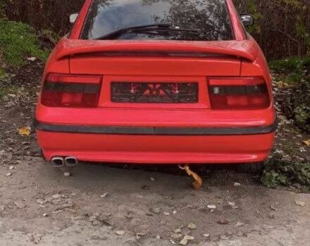 Красный Опель Калибра, объемом двигателя 2 л и пробегом 497 тыс. км за 1200 $, фото 1 на Automoto.ua