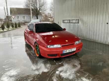Опель Калибра 1991 в Чернигове на Automoto.ua Красный Опель Калибра, объемом двигателя 2 л и пробегом 300 тыс. км за 3000 $, фото 1 на Automoto.ua