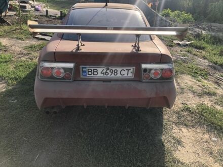 Опель Калибра 1991 в Городище на Automoto.ua Красный Опель Калибра, объемом двигателя 2 л и пробегом 300 тыс. км за 1850 $, фото 1 на Automoto.ua