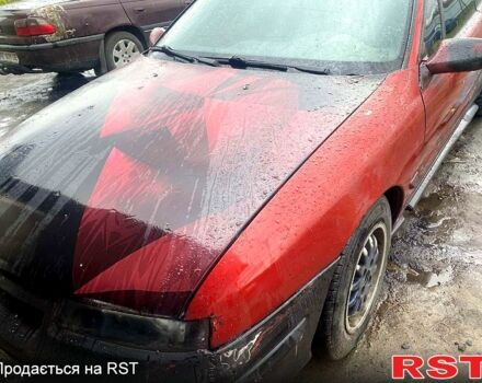 Красный Опель Калибра, объемом двигателя 2 л и пробегом 119 тыс. км за 1500 $, фото 1 на Automoto.ua