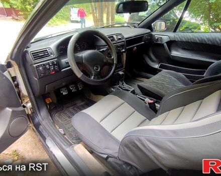 Сірий Опель Калібра, об'ємом двигуна 2 л та пробігом 333 тис. км за 1500 $, фото 4 на Automoto.ua