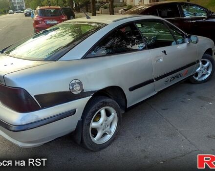 Сірий Опель Калібра, об'ємом двигуна 2 л та пробігом 333 тис. км за 1500 $, фото 3 на Automoto.ua