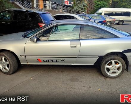 Сірий Опель Калібра, об'ємом двигуна 2 л та пробігом 333 тис. км за 1500 $, фото 2 на Automoto.ua