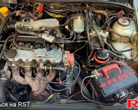 Сірий Опель Калібра, об'ємом двигуна 2 л та пробігом 333 тис. км за 1500 $, фото 6 на Automoto.ua