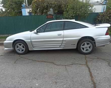 Сірий Опель Калібра, об'ємом двигуна 2 л та пробігом 317 тис. км за 2700 $, фото 6 на Automoto.ua