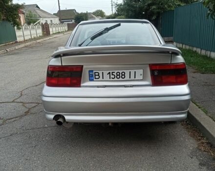 Сірий Опель Калібра, об'ємом двигуна 2 л та пробігом 317 тис. км за 2700 $, фото 9 на Automoto.ua