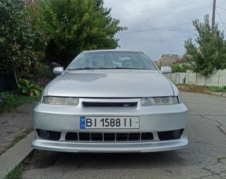 Сірий Опель Калібра, об'ємом двигуна 2 л та пробігом 317 тис. км за 2700 $, фото 12 на Automoto.ua