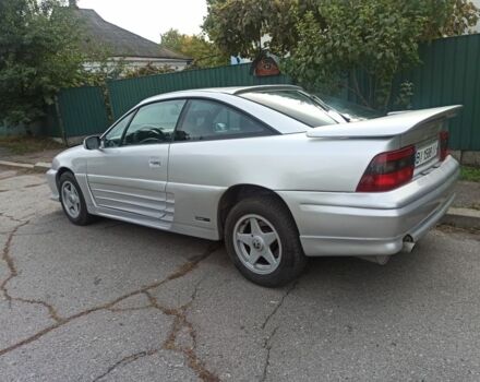 Сірий Опель Калібра, об'ємом двигуна 2 л та пробігом 317 тис. км за 2700 $, фото 8 на Automoto.ua