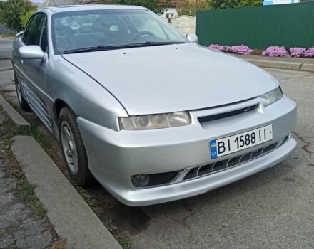 Сірий Опель Калібра, об'ємом двигуна 2 л та пробігом 317 тис. км за 2700 $, фото 11 на Automoto.ua