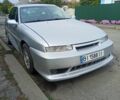Сірий Опель Калібра, об'ємом двигуна 2 л та пробігом 317 тис. км за 2700 $, фото 11 на Automoto.ua