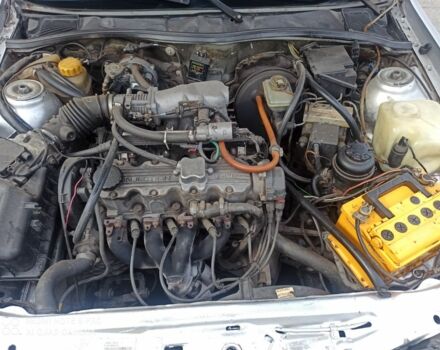 Сірий Опель Калібра, об'ємом двигуна 2 л та пробігом 317 тис. км за 2700 $, фото 15 на Automoto.ua