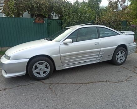 Сірий Опель Калібра, об'ємом двигуна 2 л та пробігом 317 тис. км за 2700 $, фото 5 на Automoto.ua