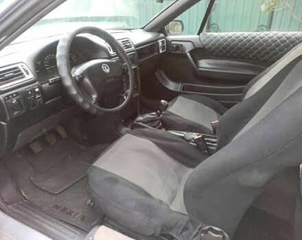 Сірий Опель Калібра, об'ємом двигуна 2 л та пробігом 317 тис. км за 2700 $, фото 13 на Automoto.ua