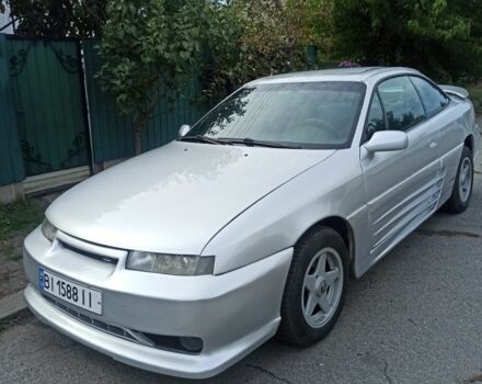 Сірий Опель Калібра, об'ємом двигуна 2 л та пробігом 317 тис. км за 2700 $, фото 1 на Automoto.ua