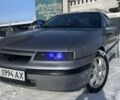 Серый Опель Калибра, объемом двигателя 2 л и пробегом 300 тыс. км за 2600 $, фото 1 на Automoto.ua