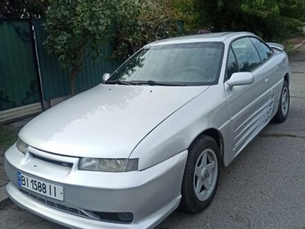 Сірий Опель Калібра, об'ємом двигуна 2 л та пробігом 317 тис. км за 2700 $, фото 1 на Automoto.ua