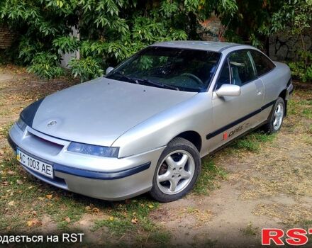 Серый Опель Калибра, объемом двигателя 2 л и пробегом 333 тыс. км за 1500 $, фото 1 на Automoto.ua