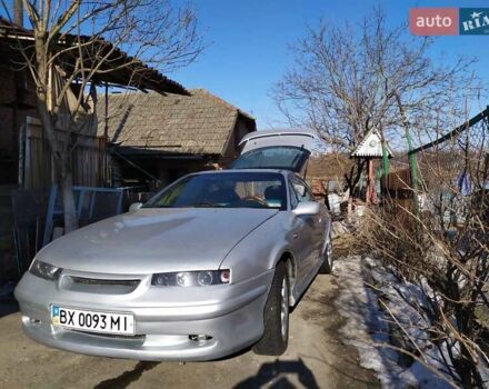 Серый Опель Калибра, объемом двигателя 2.5 л и пробегом 243 тыс. км за 3000 $, фото 1 на Automoto.ua