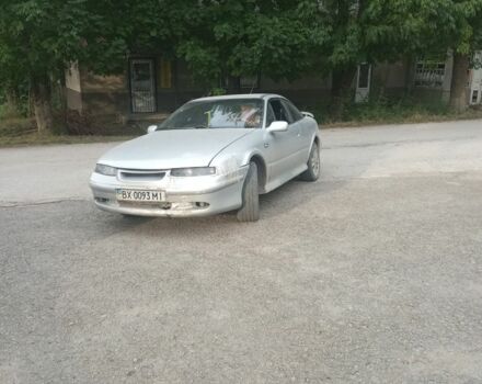 Сірий Опель Калібра, об'ємом двигуна 2 л та пробігом 400 тис. км за 2100 $, фото 1 на Automoto.ua