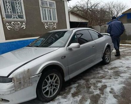 Серый Опель Калибра, объемом двигателя 2.5 л и пробегом 250 тыс. км за 2550 $, фото 1 на Automoto.ua