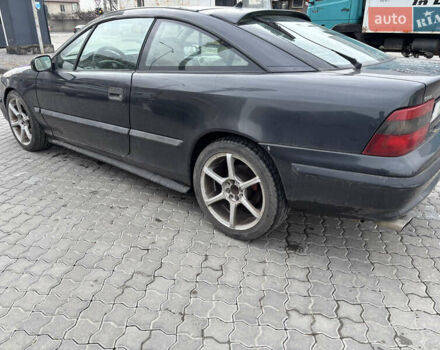 Серый Опель Калибра, объемом двигателя 2 л и пробегом 170 тыс. км за 1800 $, фото 1 на Automoto.ua