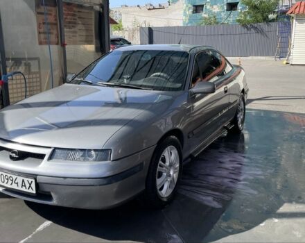 Серый Опель Калибра, объемом двигателя 2 л и пробегом 233 тыс. км за 4000 $, фото 1 на Automoto.ua